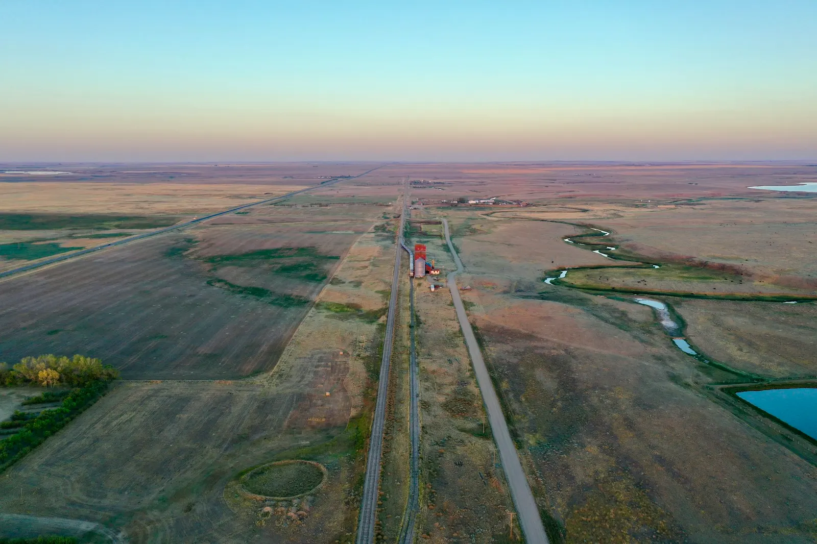 Aerial view of a straight road across the plains